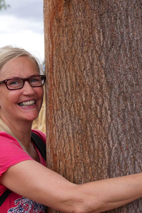 Tina Bjerke hugging a 20-year old mukau tree